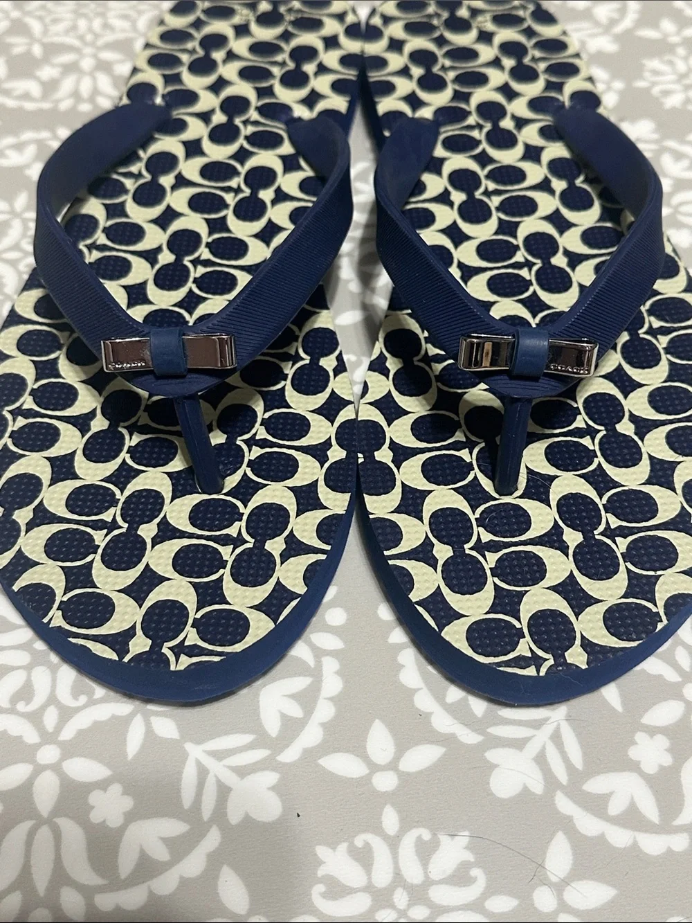 Coach Navy & Cream Bow Adorned Flip Flops